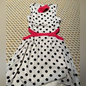 Bought at a vintage market in the UK. Size 14 UK.